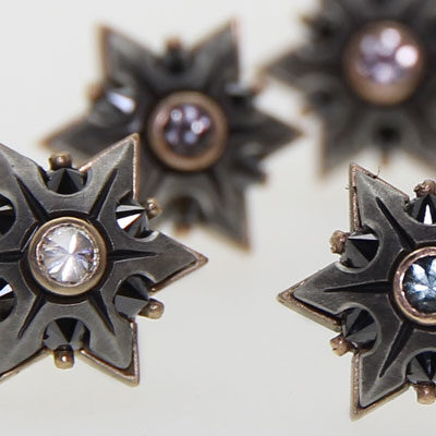 Ohrstecker - Stahl in Kombination mit Rot- Rosé- oder Gelbgold mit Farbsteinen und schwarzen Brillanten André Schweiger Kollektion - Ohrstecker